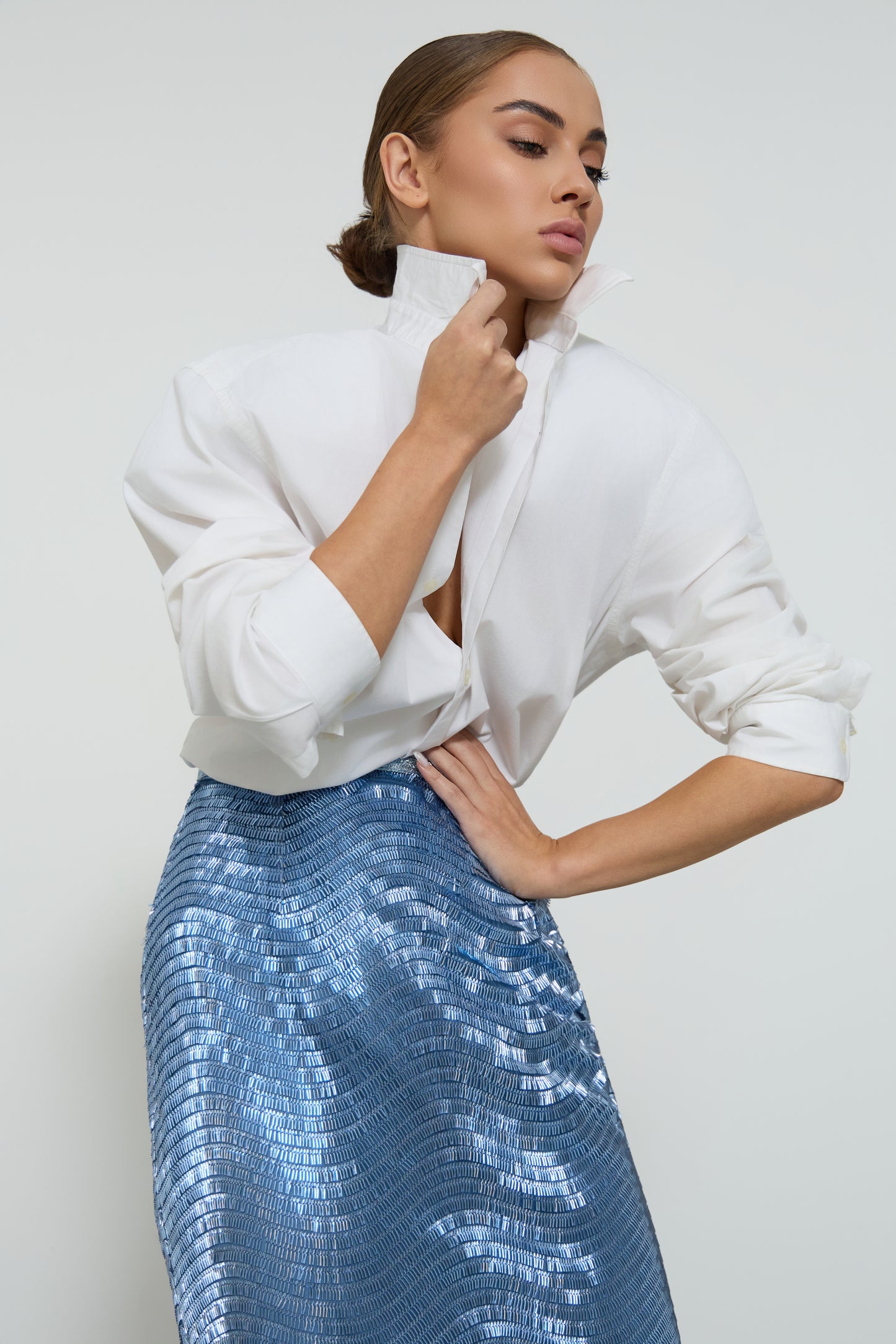 OVERSIZED SHOULDER BUTTONED SHIRT